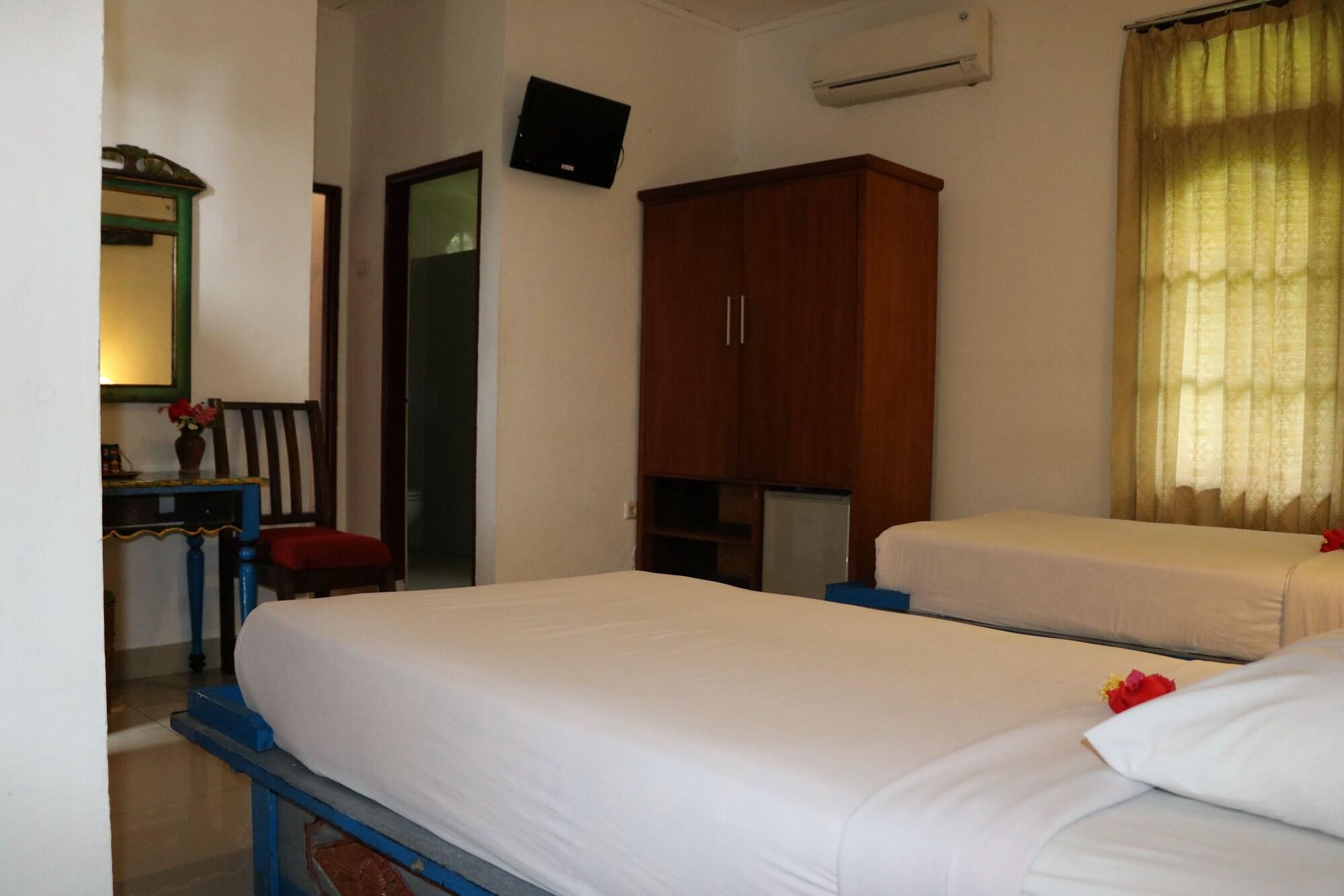 Puri Bunga Beach Cottages Сенгиги Екстериор снимка