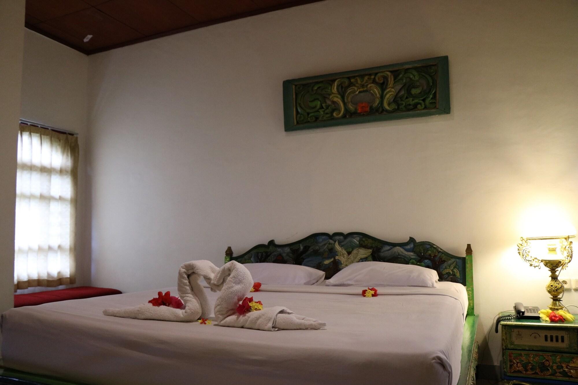 Puri Bunga Beach Cottages Сенгиги Екстериор снимка