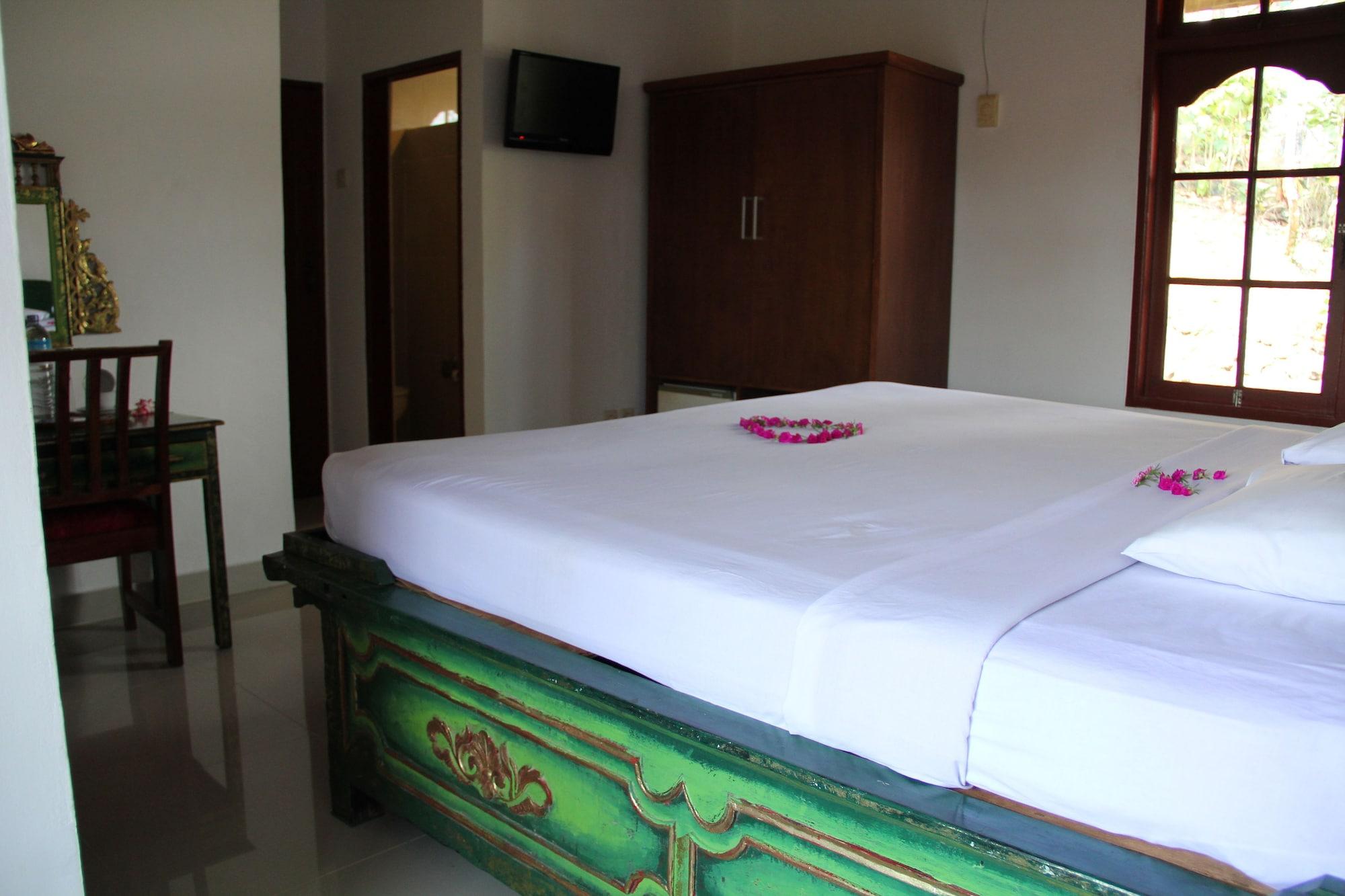 Puri Bunga Beach Cottages Сенгиги Екстериор снимка