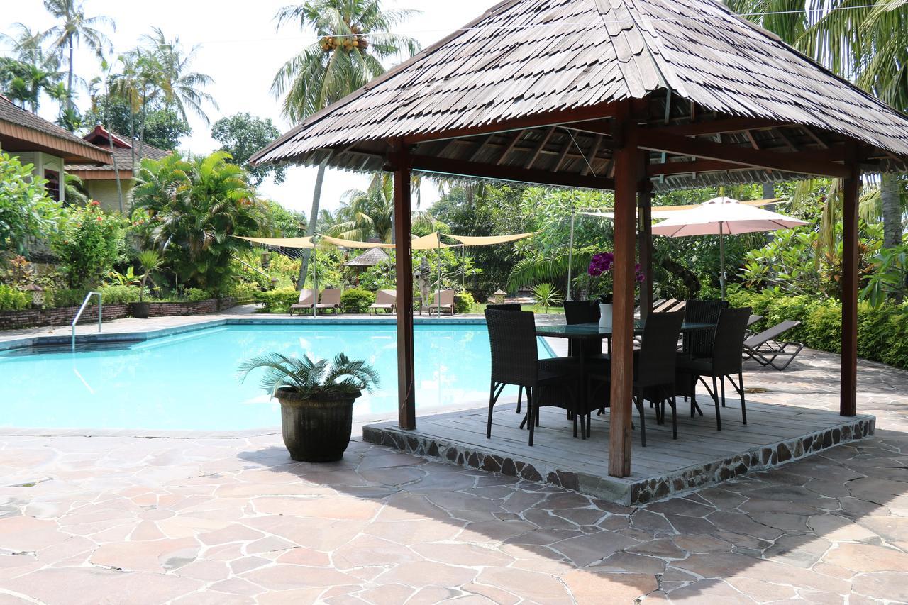 Puri Bunga Beach Cottages Сенгиги Екстериор снимка